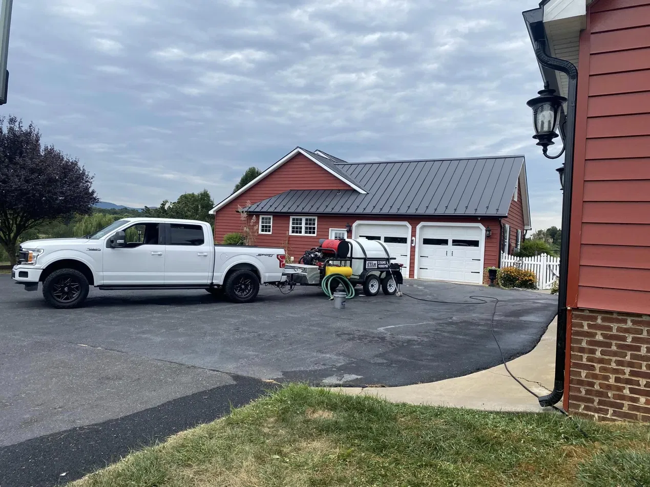 Branch and Sons truck and pressure washing trailer rig